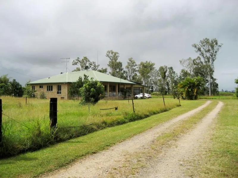 Home is? Hang on! There are two houses on this property!  Be quick as now $569,000