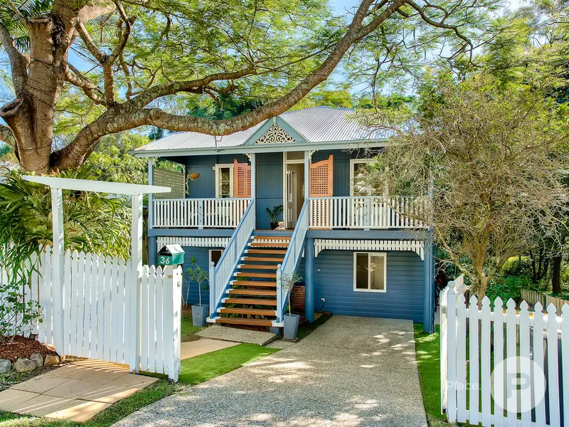 Magnificent four-bedroom Queenslander backing onto leafy parklands