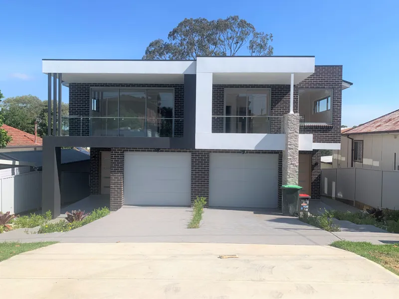 Full Brick three level duplex home with five bedrooms, lower ground floor  En-suite with separate entry and Alfresco with kitchenette (granny flat).