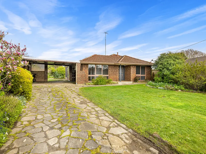 Comfortable home with established gardens!