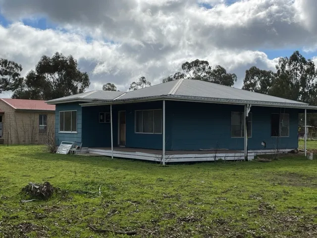 AN UNFINISHED PROJECT - THE BLUE HOUSE