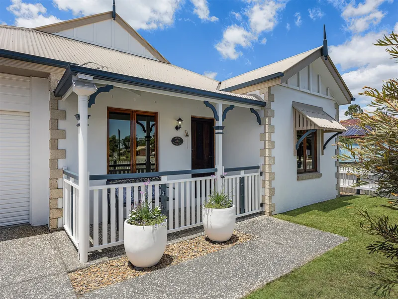 PRETTY AS A PICTURE WITH THAT COTTAGE CHARM!! BUT MOST OF ALL LOCATION!!