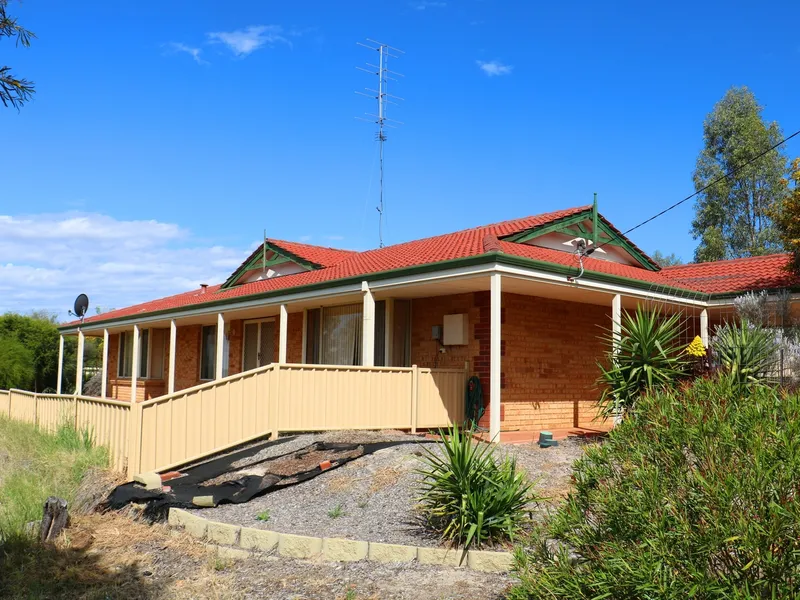 4 Bedroom, 3 Bathroom Brick & Tile Home!