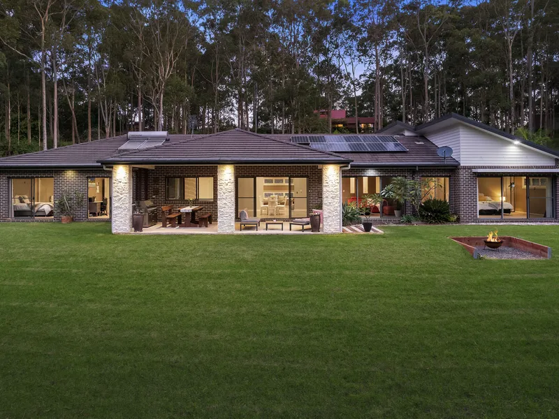 Private acreage boasts modern living and country charm