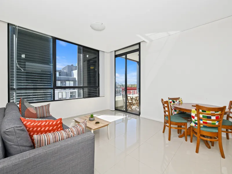 Sun-filled Top floor apartment with large car space