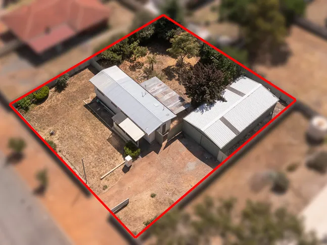 Compact Home With Large Shed