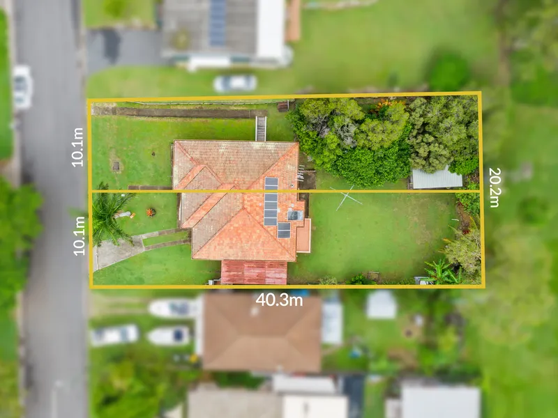 Post-war property, sitting on 2 Lots,  that holds huge potential!