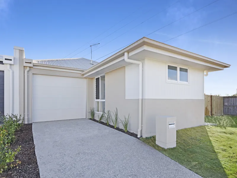 LOW MAINTENANCE LIVING + LOVELY BIG YARD - YOU WILL SIMPLY LOVE IT