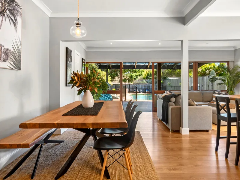 Single level family residence with studio on large level block