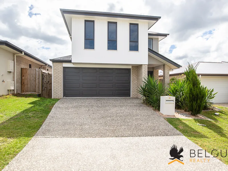 Modern home ready with a spectacular kitchen & large back yard!