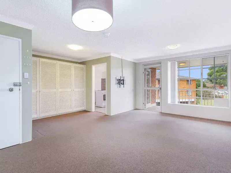 Quiet, light and airy, this top floor 2 bedroom unit is a must to inspect