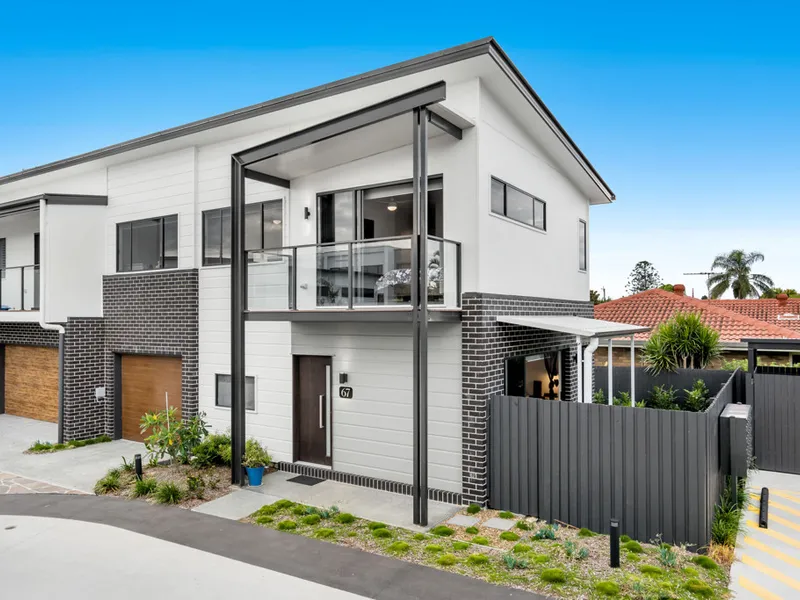 OUTSTANDING TOWNHOME OF SOPHISTICATED STYLE AND COMFORT