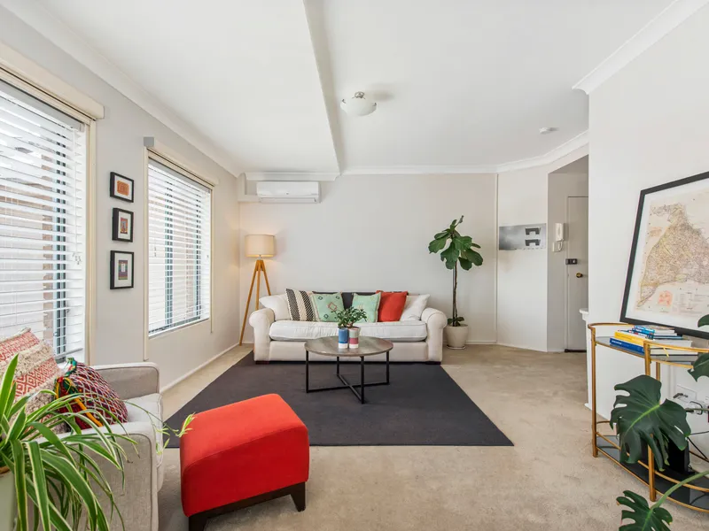 Stunning, dual level two bedroom unit positioned in prime location