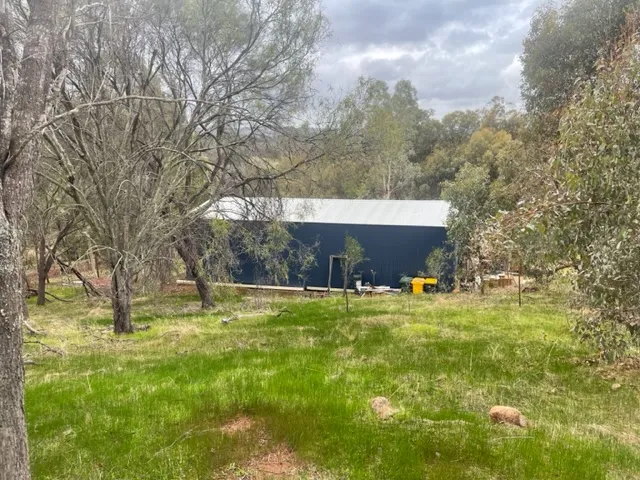 ELEVATED BLOCK WITH LARGE SHED