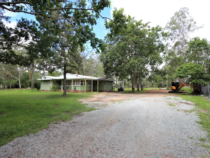 Great Opportunity, Large Home on Leveled 3.36 Acres next to the lake