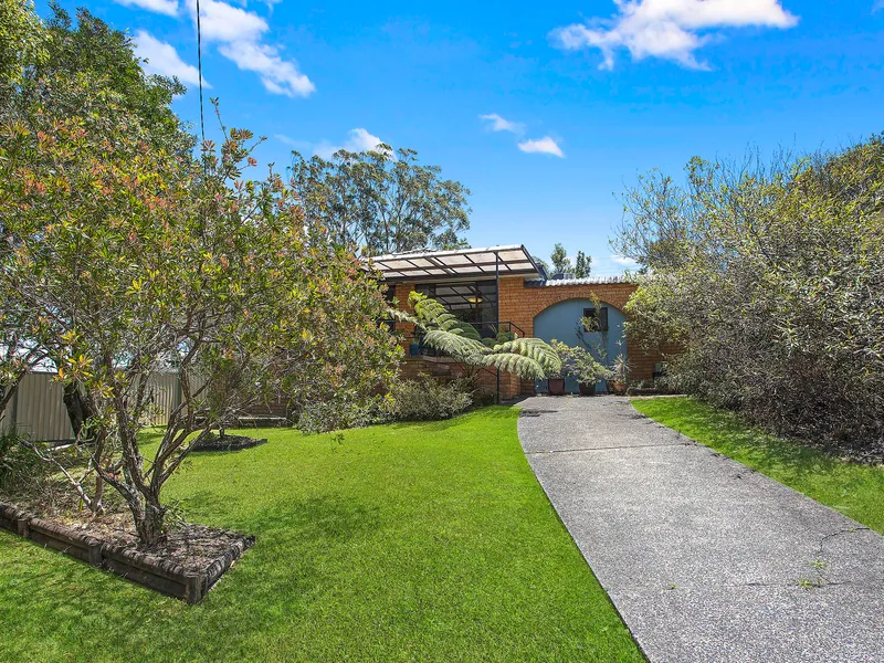Elevated Brick Family Home.