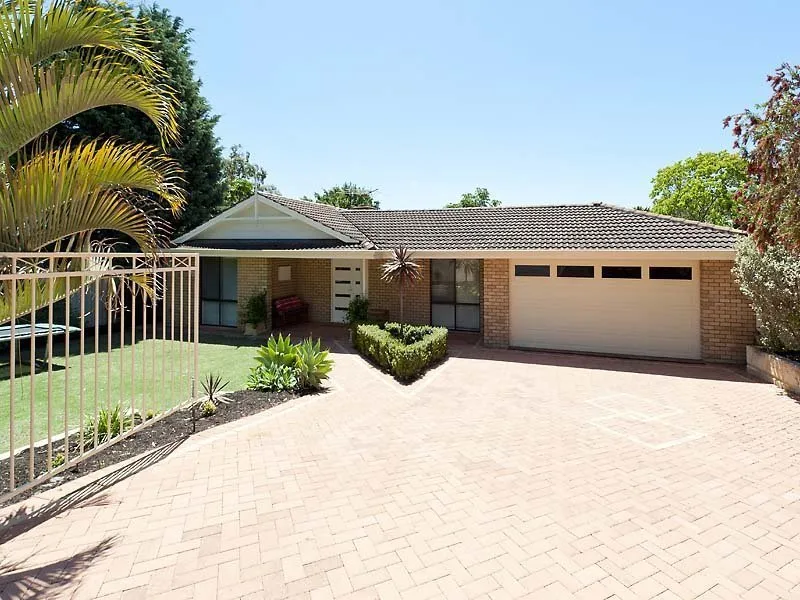 Ideal Family Home. This beautifully presented 4 bedroom 2 bathroom home with double lock up garage is located only metres from the Carine schools.