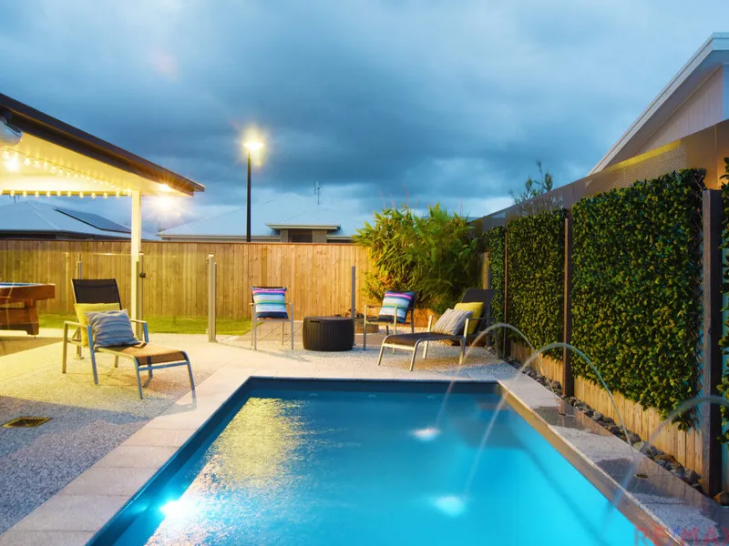 Modern home with two master bedrooms and pool!