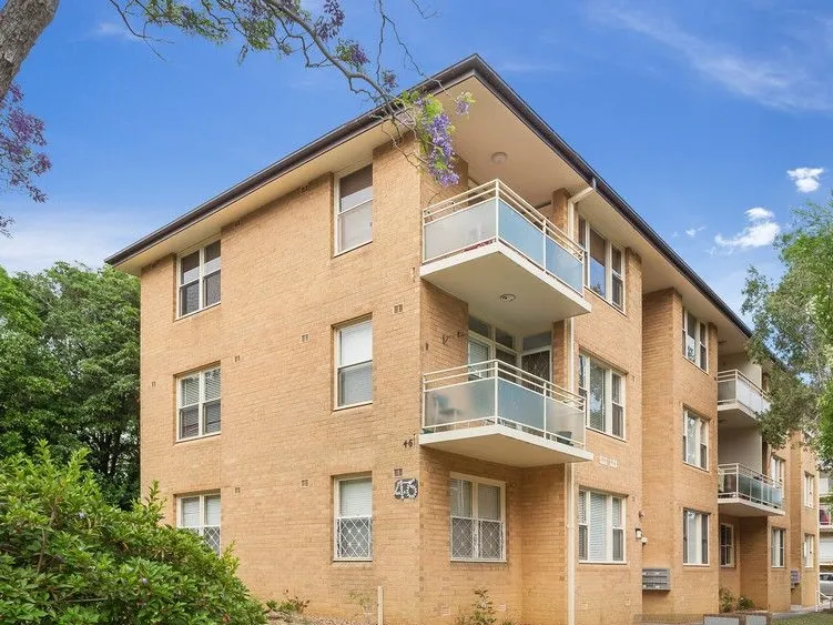 TRANQUILLY SET IN SMALL SECURE COMPLEX WITH GARAGE CLOSE TO STATION & MALL