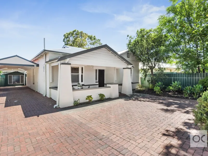 c.1925 bungalow with a beautiful start and a bright future at its north-facing finish