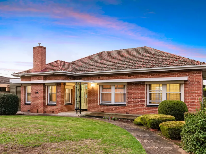 Reimagine this classic mid-century with prime development potential and Norwood International zoning…