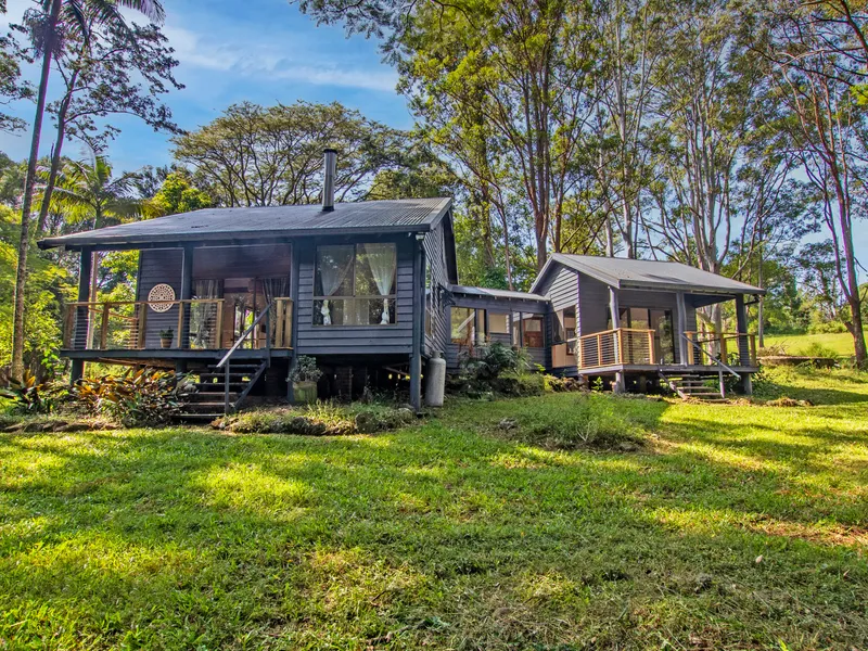 Tranquil acreage hideaway with creek frontage