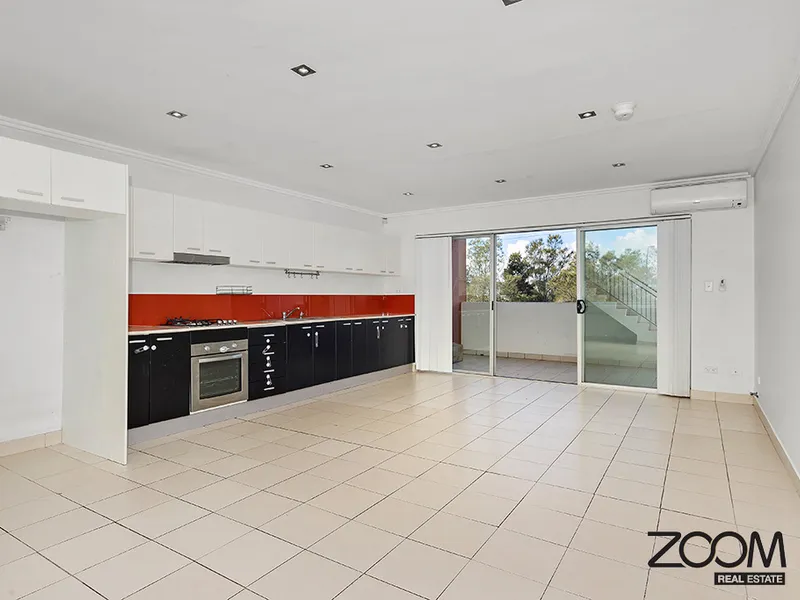 GENEROUS SPLIT LEVEL TWO BEDROOM APARTMENT