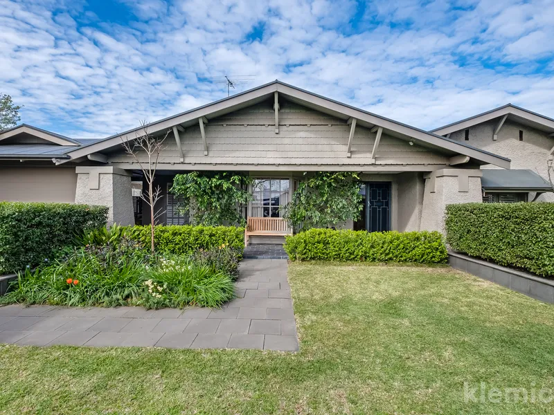 Renovated character family home on 1359sqm with established gardens and a heated in-ground pool.