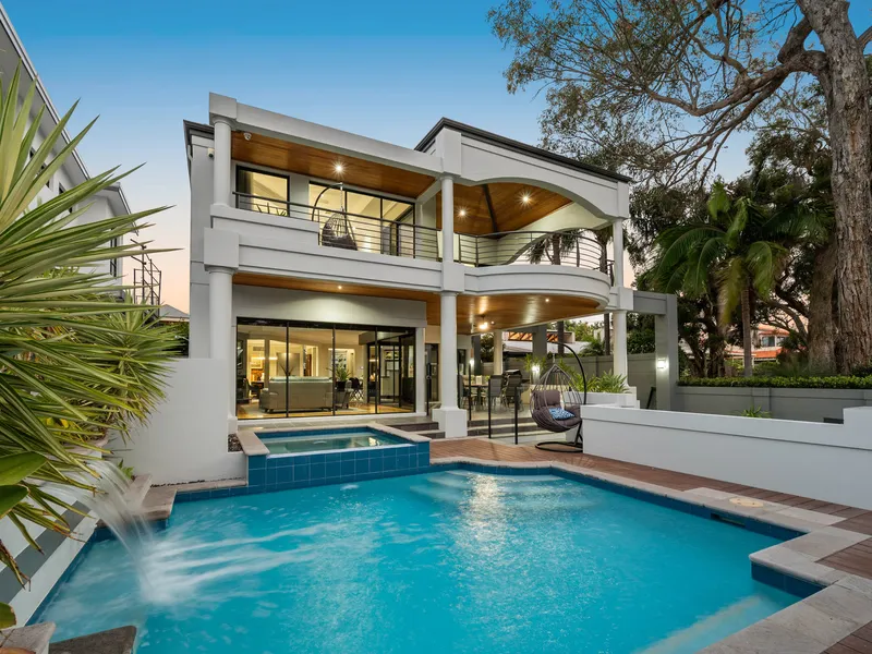 EXQUISITE RIVERFRONT LIFESTYLE AWAITS...