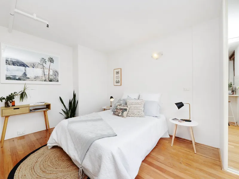 Light filled renovated studio with balcony and views