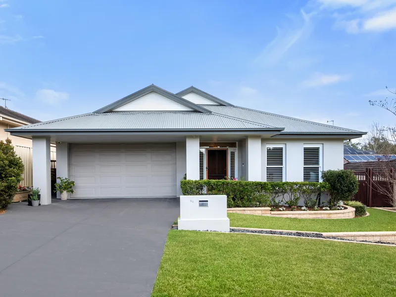 Impressive Split-Level Residence with Expansive Living Spaces in Tranquil Harrington Park