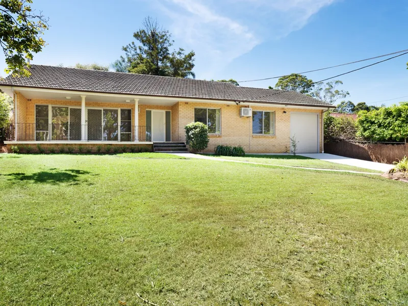SPACIOUS FAMILY HOME IN PEACEFUL BLUE RIBBON LOCATION