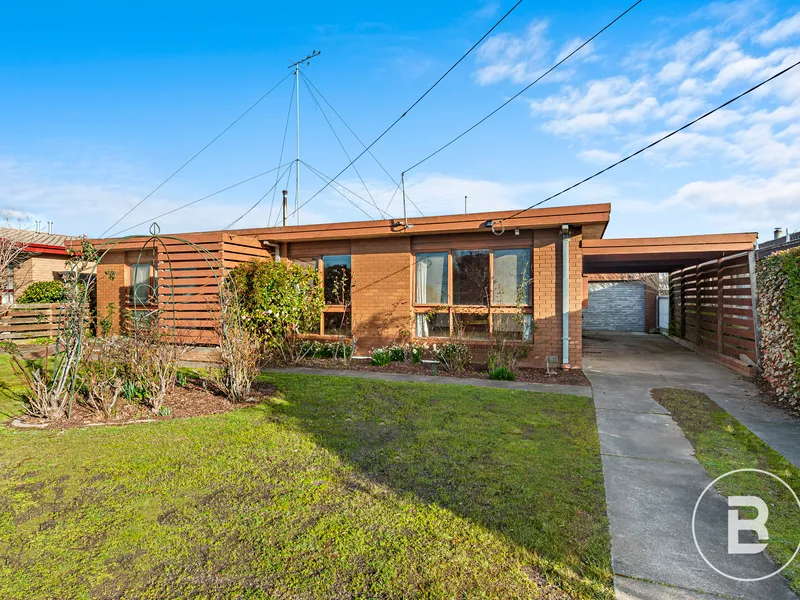 THREE BEDROOM BRICK HOME ON LARGE BLOCK