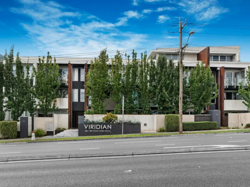 TWO LEVEL DESIRABLE APARTMENT - POSITIONED TO PERFECTION