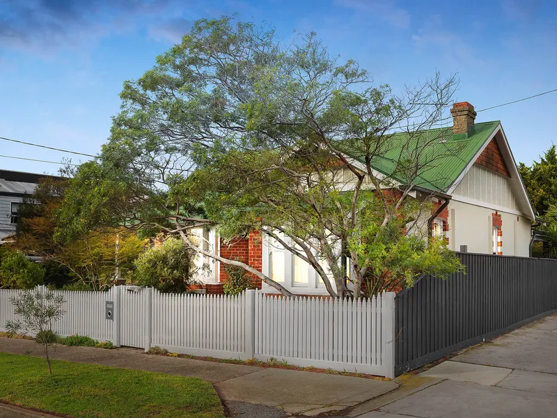 A landmark property steps to the beach and river