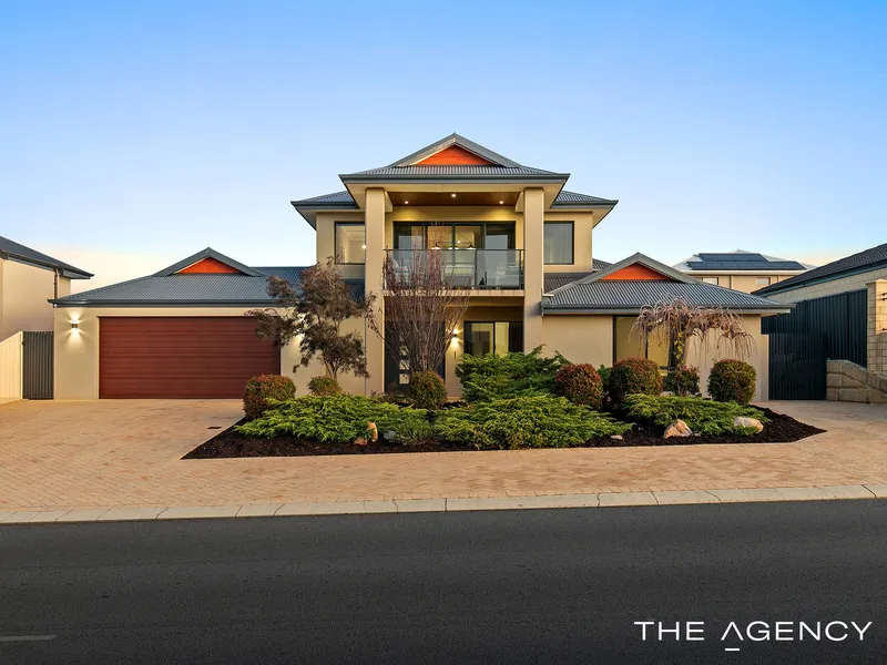 Commanding beachside abode with stunning golf course views