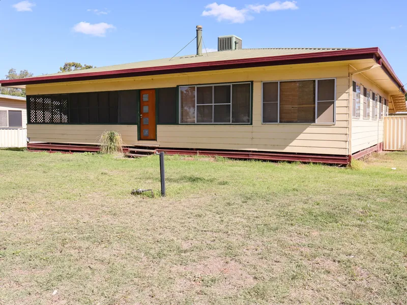Spacious Family Home with Loads of Potential plus a Shed