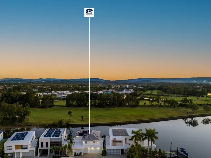 Contemporary, coastal inspired luxury on water with golf views!