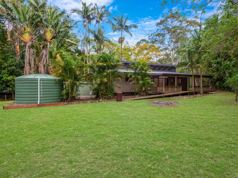 TRANQUIL RAINFOREST ACERAGE HIDEAWAY ON BONOGIN CREEK! PET FRIENDLY