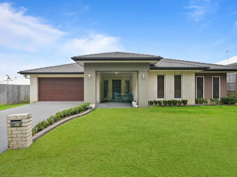EXPANSIVE FAMILY HOME WITH MULTIPLE LIVING SPACES