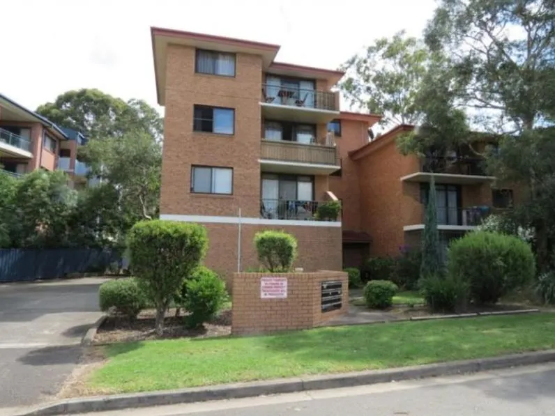 Immaculately presented 2 bedroom unit on top floor in a small complex