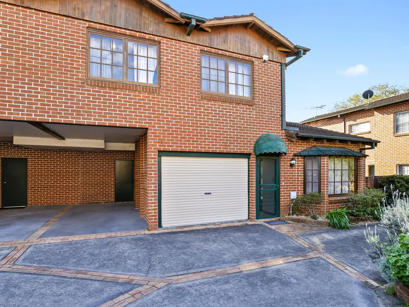Inviting Townhouse with North Facing Courtyard!
