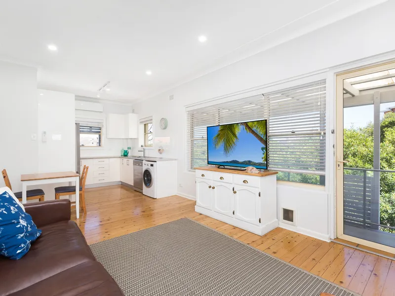 Stylish beachside apartment bathed in natural light