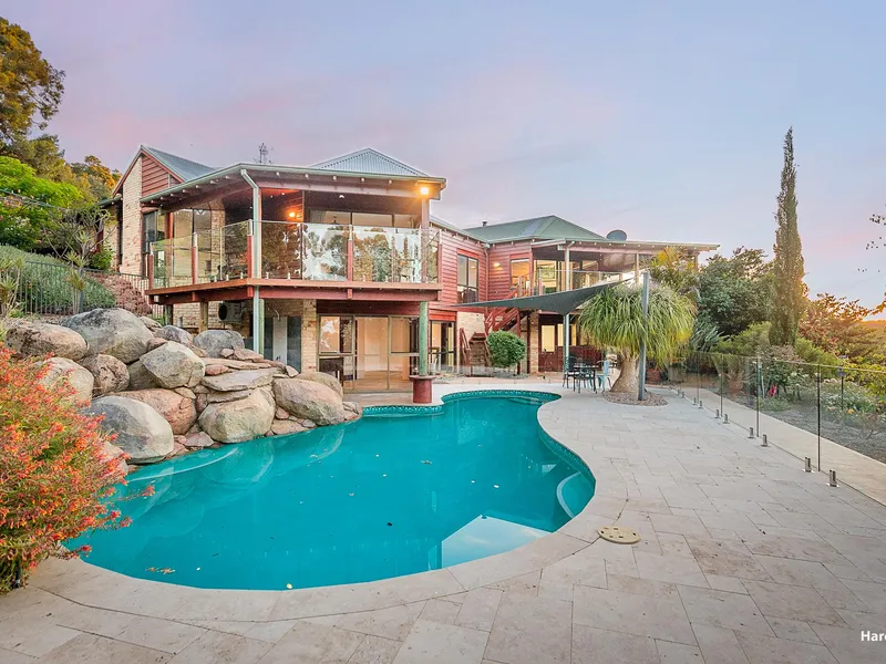 Experience Unrivaled Luxury at 5 Sawmill Place - A Gary Green Masterpiece!