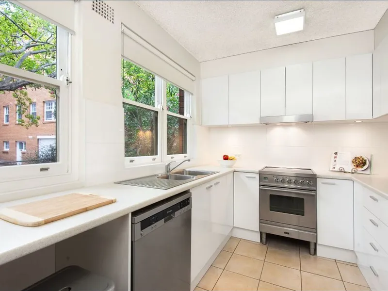 Bright renovated apartment moments to trains cafes shops and parks