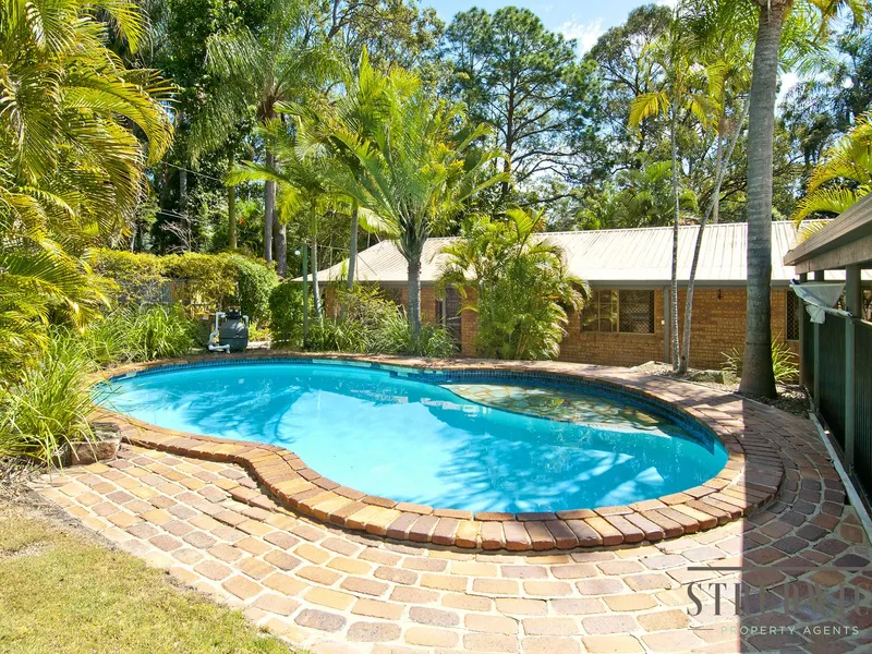 Hideaway home with pool and sheds - Convenient location!