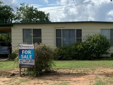 For sale three bedroom home and work shop in the quiet country town of Coonabarabran where the Warrumbungle mountains meet the stars.