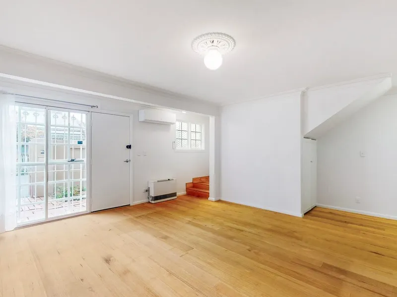 LIGHTFILLED TWO BEDROOM TWO STOREY RESIDENCE IN GREAT LOCALE