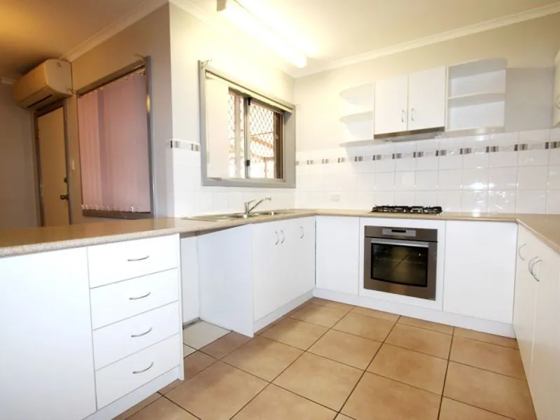 Neat 3 x 1 with large backyard and parking!