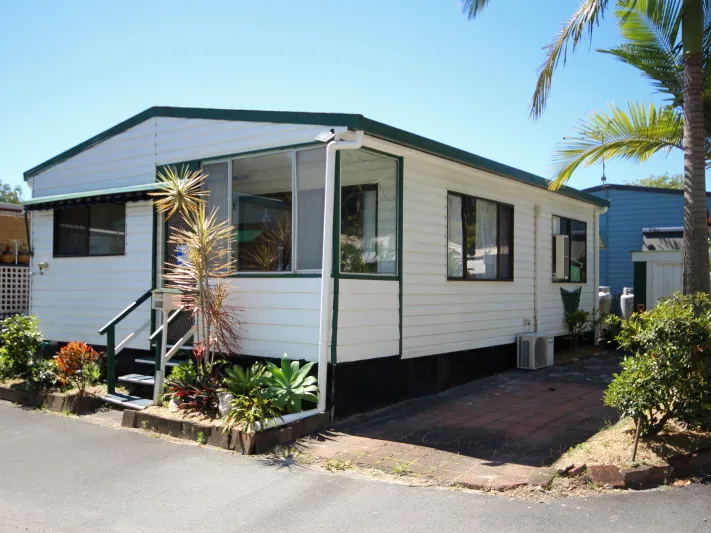 Older style, character filled one bedroom manufactured home on a corner block.